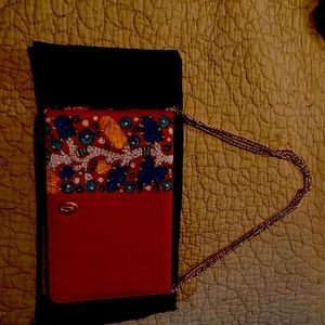 Cartier clutch/ purse as so coler full to heart designed